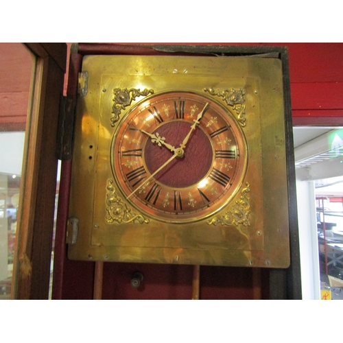 17 - An early 20th Century electric clock, 126cm tall