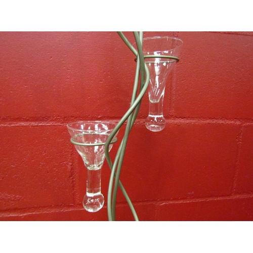 150 - A metal decorative tealight holder with four cups, 83cm tall      (E) £5-10