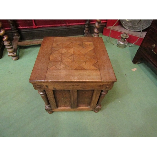 179 - An oak commode with geometric cubed top, panel and column sides, 41cm x 42.5cm x 42.5cm    (R) £15