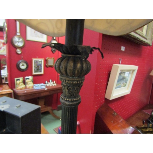 152 - A bronzed effect table lamp with column and acanthus leaf detail and silk shade, 90cm tall