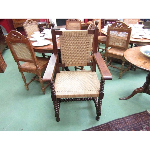 196 - An 18th Century style elbow chair with sea grass back rest and seat over bobbin turned legs and 'H' ... 