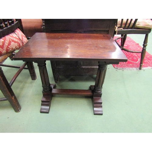 218 - A circa 1920 oak occasional table, the rectangular shaped top over turned and recessed legs on sledg... 