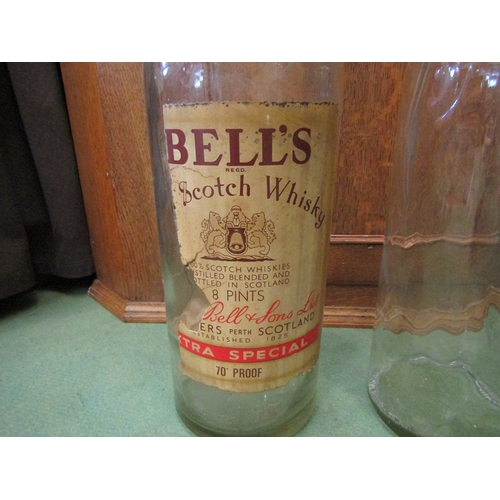 437 - Two vintage Bell's Scotch Whiskey oversized bottles, approximately 51cm tall