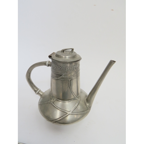 446 - A Circa 1900 Urania pewter teapot, coffee pot and milk jug with integral tray, designed possibly by ... 