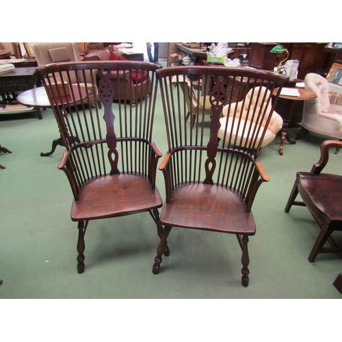 43 - A 19th Century revival set of eight elm seat Thames Valley stick back dining chairs having a wheel b... 