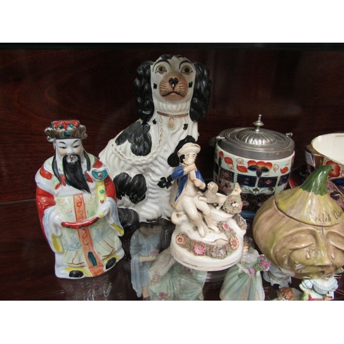 135 - A Staffordshire king charles spaniel, Staffordshire figure with bird and dog, biscuit barrel, plate,... 