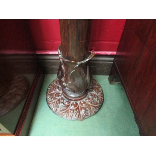 138 - A Victorian mahogany tulip carved lamp stand together with a smaller version, possibly made from par... 