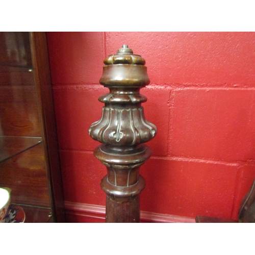 138 - A Victorian mahogany tulip carved lamp stand together with a smaller version, possibly made from par... 