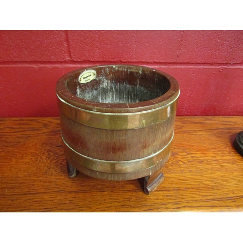 151 - An early 20th Century mahogany and copper banded jardiniere by 'Imperial' Bristol, 16.5cm tall