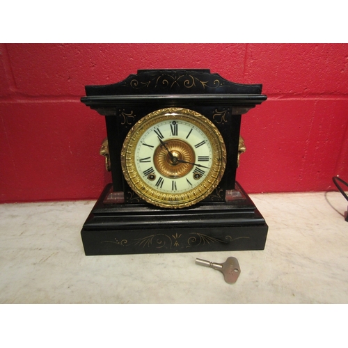 159 - A late 19th/early 20th Century black Belgian marble mantel clock with lion mask detail