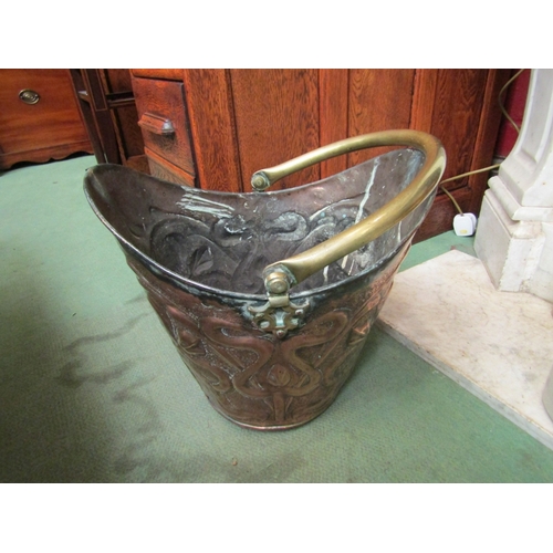 161 - An Arts & Crafts/Art Nouveau copper coal bucket with brass handle    (R) £25