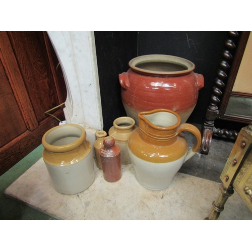 162 - A stoneware egg crock (no lid), a jug, beer bottles and ink bottles