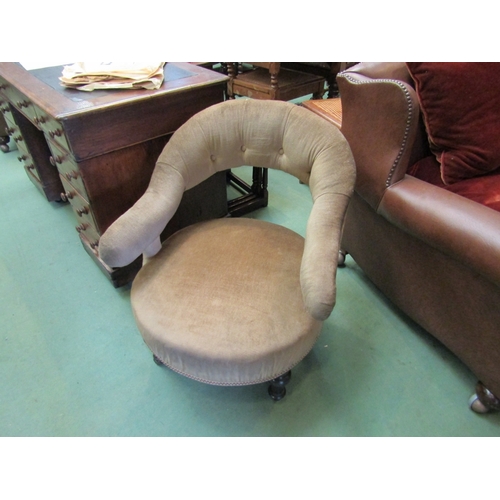 169 - An ebonised late Victorian open armchair on turned fore legs and ceramic castors   (R) £60