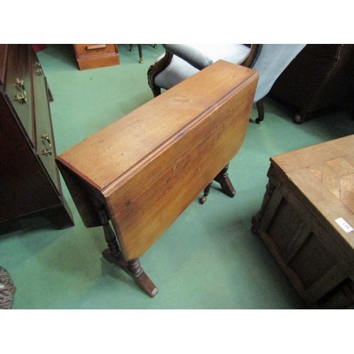 174 - A late Victorian walnut Sutherland table on turned supports with canted corners    (R) £15