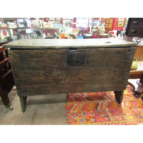 229 - A 17th century oak six plank coffer with chip mark decoration, 55cm x 88cm x 36cm