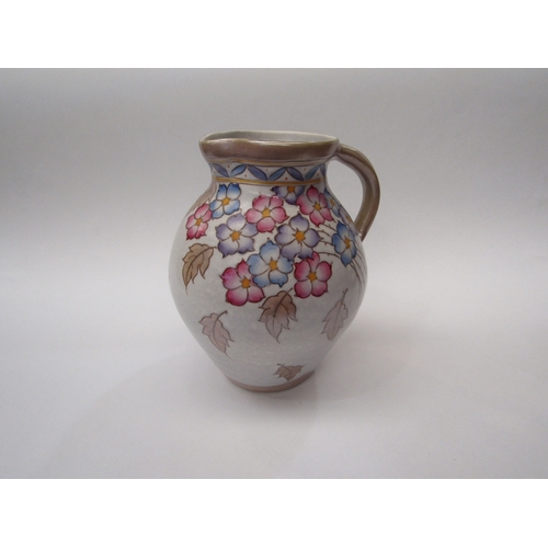 276 - A Charlotte Rhead floral jug, 22cm tall      (E) £20-30