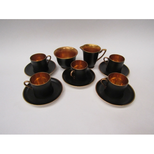 277 - A Crown Devon Devon Fieldings black and gilt coffee part set