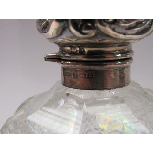 336 - A Circa 1900 silver topped crystal glass globe scent bottle