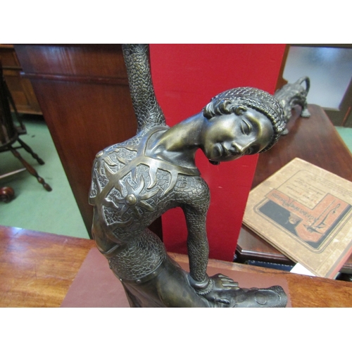 61 - A bronzed figure of an Art Deco dancer, 46cm tall