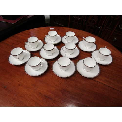 63 - A Royal Albert white and gilt part coffee set, another part coffee set and Minton Platinum Heritage ... 