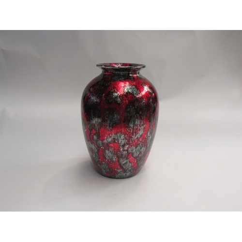 121 - A red and silvered glazed vase, 25cm tall