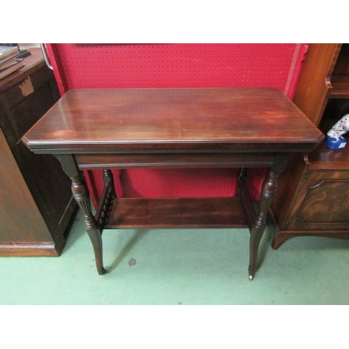 78 - Attributed to Gillows of Lancaster a Victorian walnut carved table the canted cover hinged swivel to... 