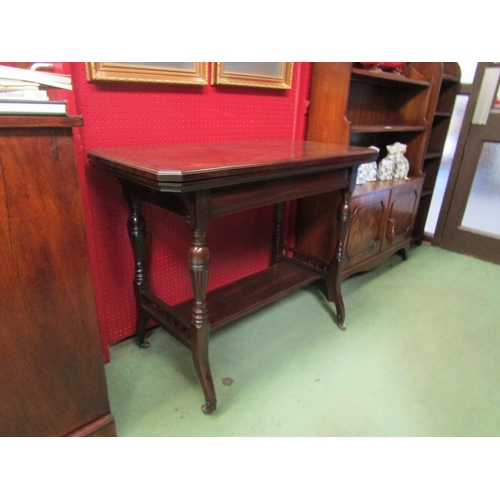 78 - Attributed to Gillows of Lancaster a Victorian walnut carved table the canted cover hinged swivel to... 