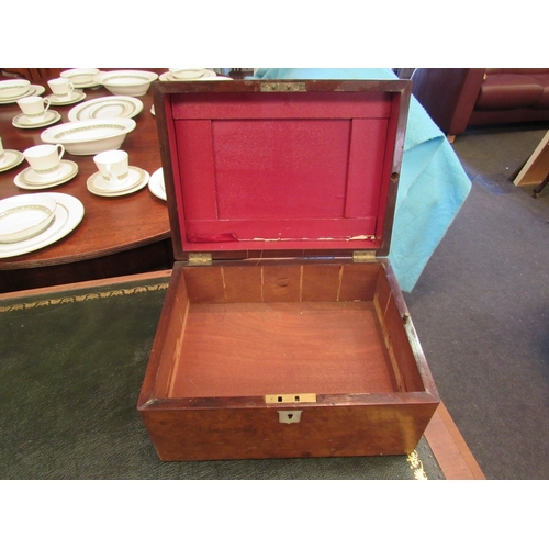 1018 - A Victorian walnut vanity box with base secret drawer