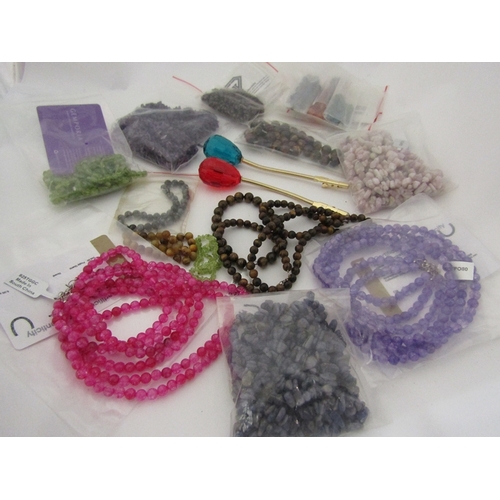 345 - A quantity of bracelets and necklaces, including tigers eye, amethyst and kunzite