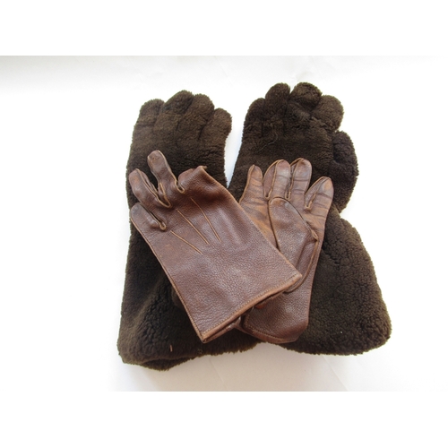 302 - A pair vintage leather and fleece winter motorcycle gauntlets along with a pair of leather driving g... 