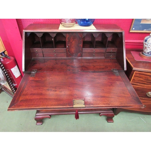 27 - An early George III Circa 1780 flame mahogany bureau the fitted interior of eight drawers/pigeon hol... 