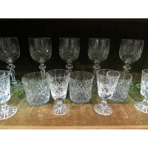 46 - A part suite of crystal glasses including tumblers, champagne and wine