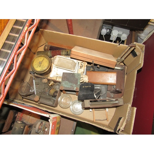 308 - A box containing bygone items including leather bound telescopes, chemistry test tubes and a Fowlers... 