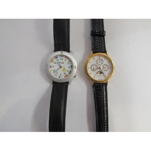 351 - A 'Titan' quartz watch with a full moon calendar face and a Kauta fashion watch