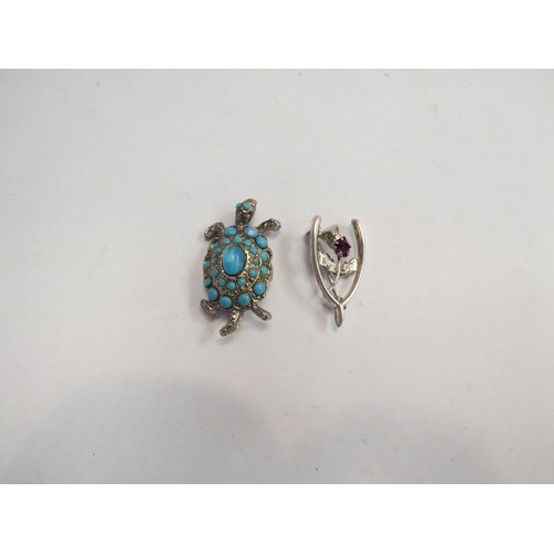 317 - Two white metal brooches including turtle design example