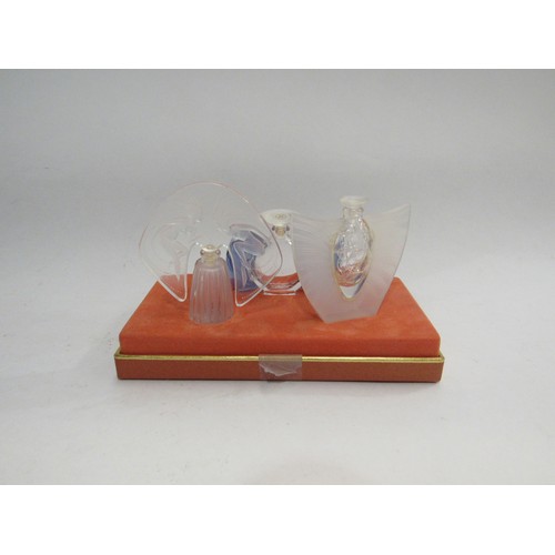 346 - Lalique Les Introuvables 'The Ultimate Collection' three stylised perfume bottles, boxed