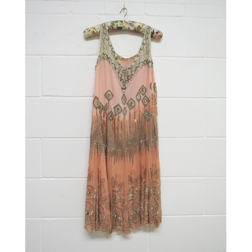 1236 - A 1920's wonderful chiffon peach silk two tone evening dress decorated with pearlised beads, chiffon... 