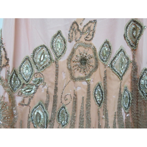 1236 - A 1920's wonderful chiffon peach silk two tone evening dress decorated with pearlised beads, chiffon... 