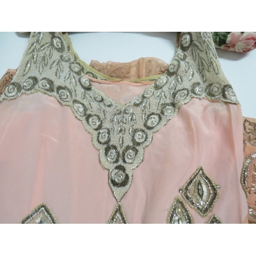 1236 - A 1920's wonderful chiffon peach silk two tone evening dress decorated with pearlised beads, chiffon... 