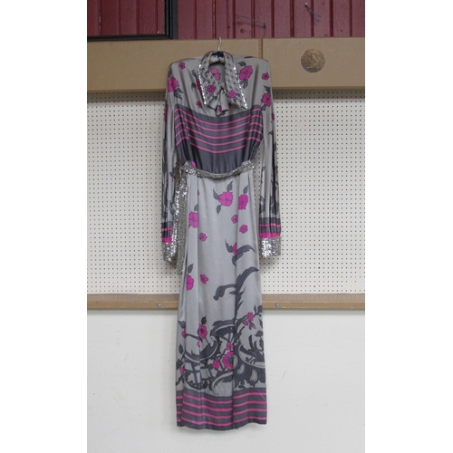 1232 - An early 1970's grey silk full length cocktail dress with a fuchsia pink stripe and floral pattern, ... 