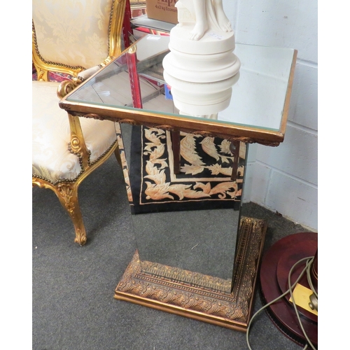 1009 - A pair of ornate mirrored pedestals with bevel edge columns, gilt base and rim a/f, 76cm tall