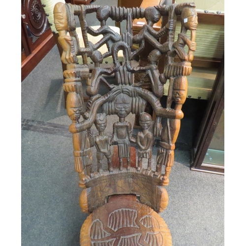 1108 - An African hardwood birthing chair. 95cm high