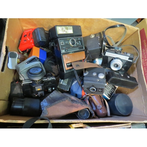 1246 - Four boxes containing cameras and accessories, some for spares and repairs to include Panasonic vide... 