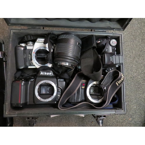 1259 - Three cases containing photographic items including Nikon, Minolta, Konica etc. Cameras for spares a... 