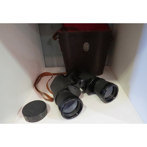 1304 - Charles Frank-Nipole binoculars in brown leather case