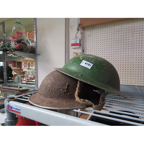 4101 - Two tin military helmets