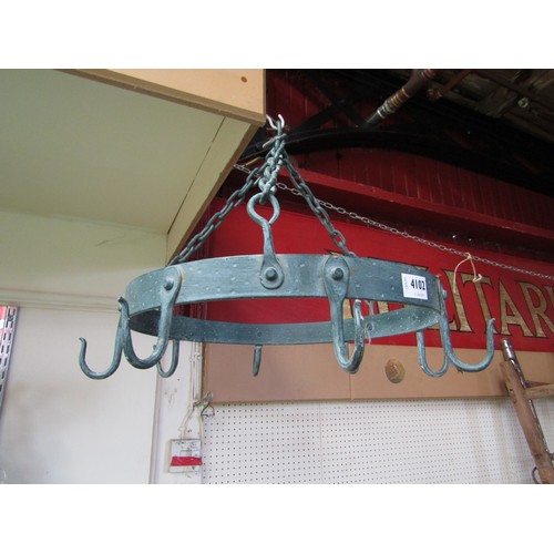 4102 - A circular metal game hanger, 8 hooks