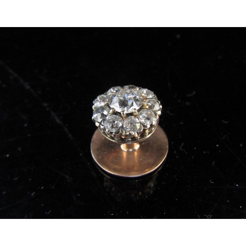 5065 - A diamond set floral cluster with 0.50ct approx centre diamond, screw fitting, can be worn as a stud... 