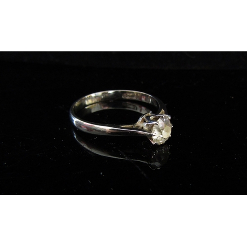 5069 - A white gold diamond solitaire ring, 0.50ct approx, stamped 18ct. Size N/O, 2g