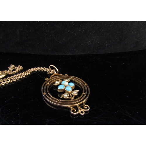 5073 - An Edwardian pendant of floral form stamped 8c hung on a metal chain, a gold chain stamped 9ct and a... 